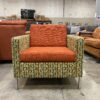 Bright Orange Chair with Yellow Designed Frame