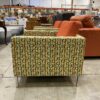 Bright Orange Chair with Yellow Designed Frame