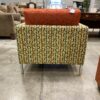 Bright Orange Chair with Yellow Designed Frame