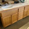 White Tile-Top 2-Sink Cabinet w/ Faucets