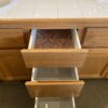 White Tile-Top 2-Sink Cabinet w/ Faucets