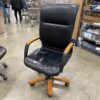 Black Leather and Warm Wood Rolling Office Chair