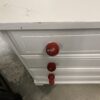 Compact White 4 Drawer Dresser with Red Knobs