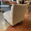 Beige Curved Armless Chair