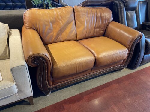 Saddle Colored Love Seat with Wood Details