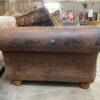 Vintage Look Aged Leather Pillow Backed Loveseat