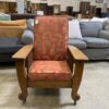 Wood Framed Rolling Lounge Chair with Orange Fern Cushion