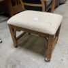 YOUNG HINKLE Wicker Wrapped Rolling Footstool