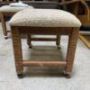 YOUNG HINKLE Wicker Wrapped Rolling Footstool