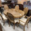 Modern Starburst Patterned Dining Table with 6 Rattan Chairs