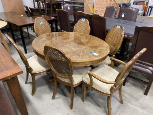 Modern Starburst Patterned Dining Table with 6 Rattan Chairs