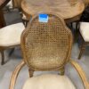 Modern Starburst Patterned Dining Table with 6 Rattan Chairs