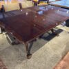 Glossy Table with Claw Foot Detail