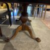 Glossy Table with Claw Foot Detail