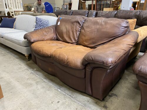 Well Loved Caramel Leather Loveseat