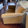 Tan Loveseat with Brown Piping