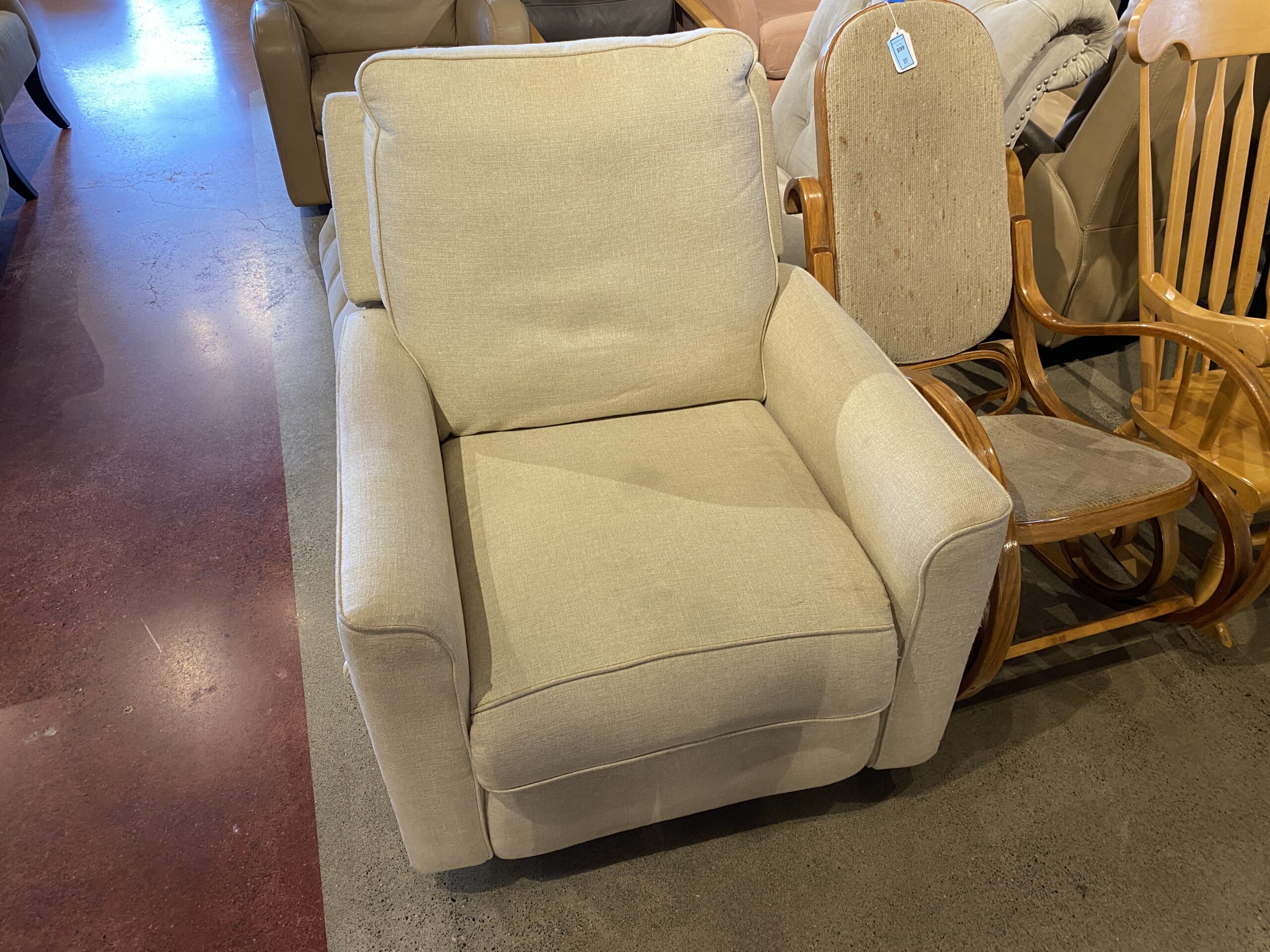 Cream Colored Swivel Recliner