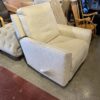 Cream Colored Swivel Recliner