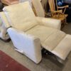 Cream Colored Swivel Recliner