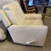 Cream Colored Swivel Recliner