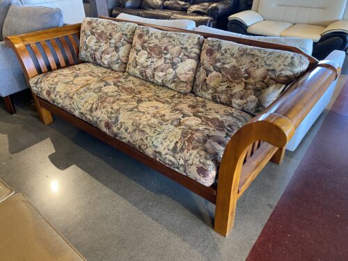 Wood Frame Couch with Floral Cushions