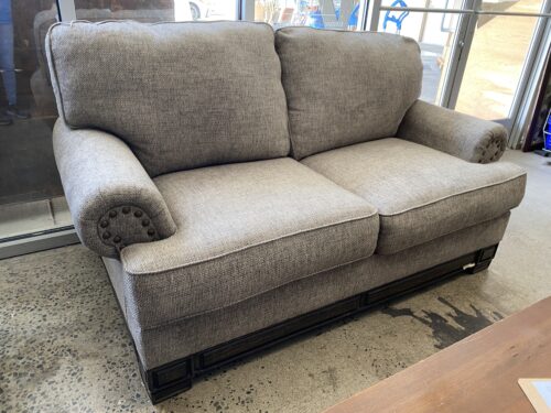 WANEK Grey Fabric Loveseat w/ Large Brass Nailhead Trim