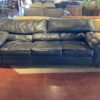 Well-Loved Old School Black Sofa