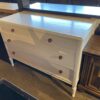White Three Drawer Dresser with Decorative Knobs