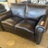 ABBYSON Two Seater Black Leather Loveseat with Nailhead Detail