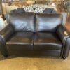 ABBYSON Two Seater Black Leather Loveseat with Nailhead Detail