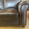 ABBYSON Two Seater Black Leather Loveseat with Nailhead Detail