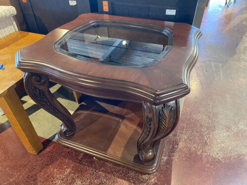 Traditional Dark Wood End Table with Glass Top and Carved Legs