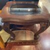 Traditional Dark Wood End Table with Glass Top and Carved Legs
