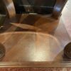 Traditional Dark Wood End Table with Glass Top and Carved Legs