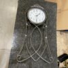 HOWARD MILLER Shannon Bent Metal Wall Clock