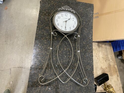 HOWARD MILLER Shannon Bent Metal Wall Clock