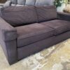 Plum Colored Fabric Loveseat