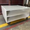 Square White Glass Top Rolling Coffee Table
