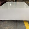 Square White Glass Top Rolling Coffee Table
