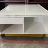 Square White Glass Top Rolling Coffee Table