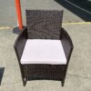 Two Outdoor Wicker Chairs and Side Table with Lilac Cushions