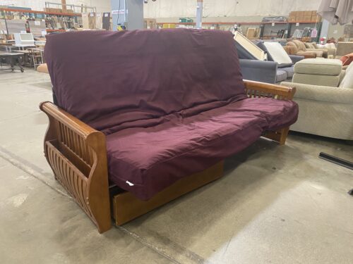 Burgundy Futon With Wooden Magazine Rack Arms