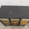 Black Framed Dresser with Warm Metallic Drawers