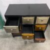 Black Framed Dresser with Warm Metallic Drawers