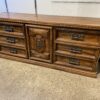 Nine Drawer Wood Dresser with Ornate Carvings