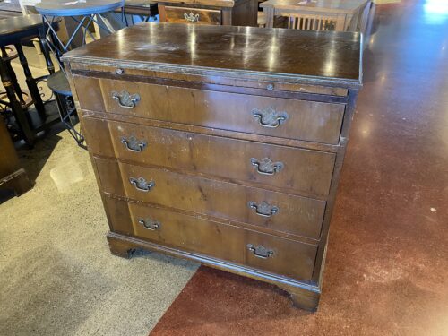 Vintage Four-Drawer Chest with Unique Wood Grain and Brass Pulls