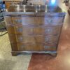 Vintage Four-Drawer Chest with Unique Wood Grain and Brass Pulls