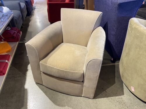 DONGHIA Cream Colored Swivel Chair