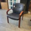STEELCASE Black Leather Office Chair with Red Wood Arms