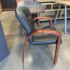 STEELCASE Black Leather Office Chair with Red Wood Arms
